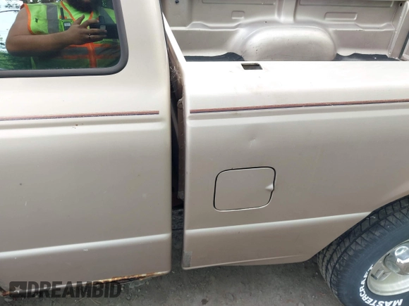 1996 Ford Ranger Splash with VIN 1FTCR14X6TTA69715, listed as a IAAI auction lot 42220603 with 292,607 mi miles and . Bid and sale history available at DreamBid. Image 6.