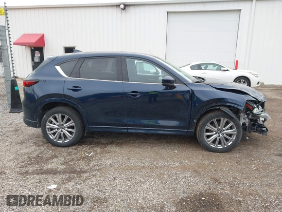 2023 Mazda CX-5 Signature with VIN JM3KFBXY5P0251046, listed as a IAAI auction lot 41505815 with 37,594 mi miles and . Bid and sale history available at carsss.com. Image 13.