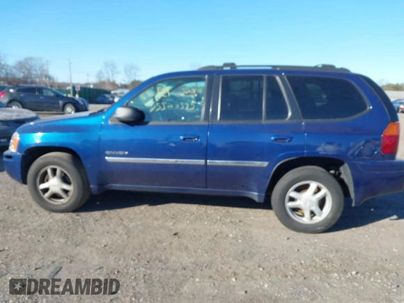 2006 GMC Envoy SLT with VIN 1GKDT13S762170322, listed as a IAAI auction lot 41324540 with 999,999 mi miles. Bid and sale history available at carsss.com. Image 13.