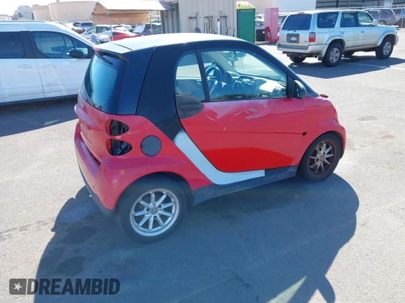 2009 Smart fortwo Pure z VIN WMEEJ31XX9K219695, wystawiony jako IAAI lot #41280141 z przebiegiem 93 896 mil mil oraz . Historia ofert i sprzedaży dostępna na DreamBid. Obrazek 4.