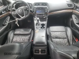 2016 Nissan Maxima Platinum with VIN 1N4AA6AP8GC406798, listed as a Copart auction lot 60143595 with 134,704 mi miles and Salvage title. Bid and sale history available at DreamBid. Image 8.