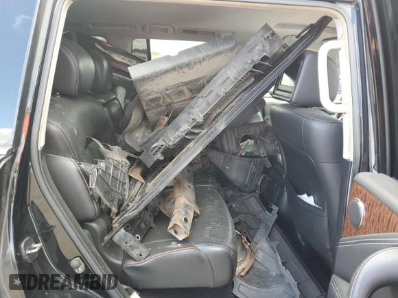 2017 Nissan Armada Platinum z VIN JN8AY2NCXH9504904, wystawiony jako Copart lot #58023935 z przebiegiem Nie podano mil oraz Szkoda całkowita • Salvage title. Historia ofert i sprzedaży dostępna na DreamBid. Obrazek 10.