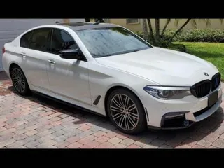 2018 BMW 5 Series 530i xDrive with VIN WBAJA7C51JWA74706, listed as a Copart auction lot 63532655 with 131,465 mi miles and Clean title. Bid and sale history available at DreamBid. Image 1.