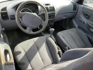 2003 Hyundai Accent GL with VIN KMHCG35CX3U270374, listed as a Copart auction lot 47240325 with 122,739 mi miles and Salvage Title. Bid and sale history available at carsss.com. Image 8.