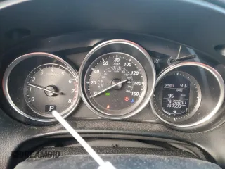 2014 Mazda CX-5 Touring с VIN JM3KE2CY3E0308740, выставлен на аукционе Copart как лот 88127365 с пробегом 137 690 миль миль и Списание • Salvage title. История ставок и продаж доступна на DreamBid. Изображение 9.