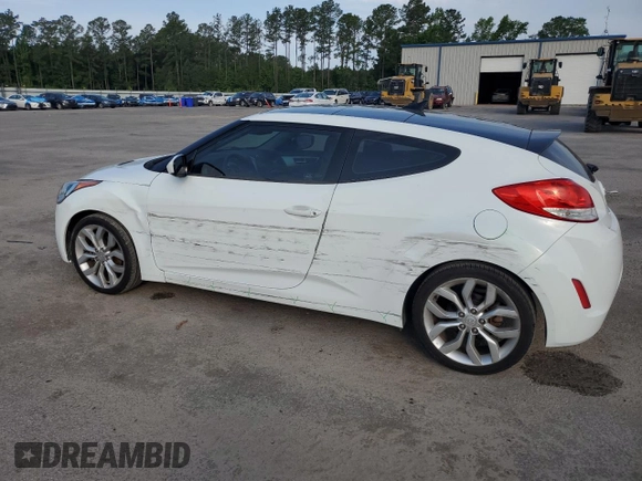 2013 Hyundai Veloster w/Gray Int with VIN KMHTC6ADXDU130886, listed as a Copart auction lot 57478095 with 130,008 mi miles and Salvage title. Bid and sale history available at DreamBid. Image 2.