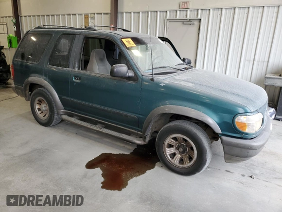 1998 Ford Explorer Sport with VIN 1FMYU22X4WUB36948, listed as a Copart auction lot 76699374 with 266,977 mi miles and Salvage title. Bid and sale history available at DreamBid. Image 4.