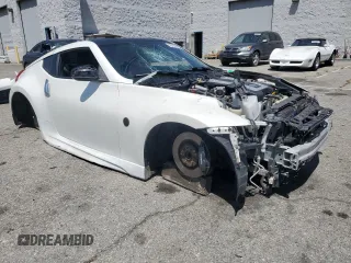 2012 Nissan 370Z z VIN JN1AZ4EH1CM562134, wystawiony jako Copart lot #56708065 z przebiegiem Nie podano mil oraz Szkoda całkowita • Salvage title. Historia ofert i sprzedaży dostępna na DreamBid. Obrazek 4.