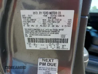 2011 Ford Escape Limited with VIN 1FMCU9EG9BKB85048, listed as a Copart auction lot 55146615 with 148,527 mi miles and Clean Title. Bid and sale history available at carsss.com. Image 13.