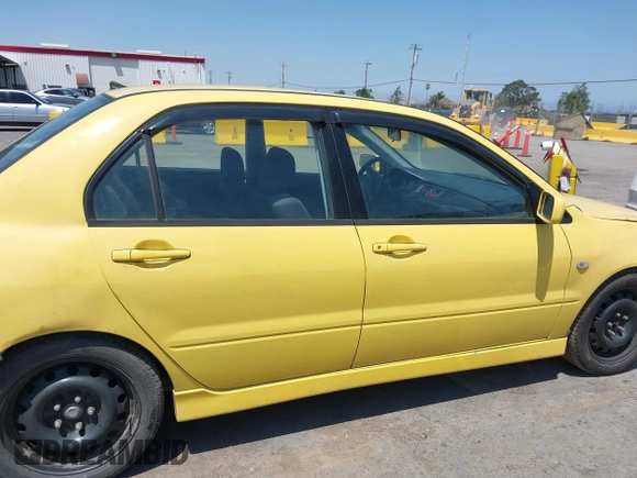 2002 Mitsubishi Lancer OZ-Rally z VIN JA3AJ86EX2U073129, wystawiony jako IAAI lot #42337379 z przebiegiem 257 556 mil mil oraz . Historia ofert i sprzedaży dostępna na DreamBid. Obrazek 14.
