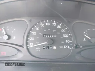 1997 Ford Escort LX with VIN 1FALP13P3VW125396, listed as a IAAI auction lot 42036066 with 132,239 mi miles. Bid and sale history available at carsss.com. Image 7.