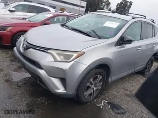 2016 Toyota RAV4 LE with VIN 2T3ZFREV5GW251763, listed as a IAAI auction lot 41655532 with 147,873 mi miles. Bid and sale history available at carsss.com. Image 2.