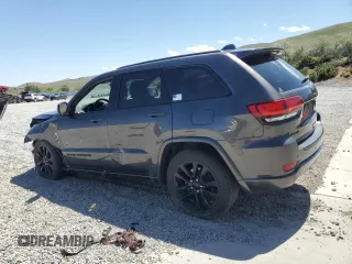 2018 Jeep Grand Cherokee Altitude with VIN 1C4RJFAG5JC320742, listed as a Copart auction lot 56988195 with 140,320 mi miles and Salvage title. Bid and sale history available at DreamBid. Image 2.