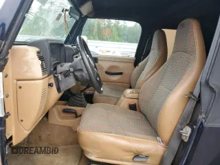 1997 Jeep Wrangler Sport with VIN 1J4FY19S2VP452229, listed as a Copart auction lot 60422775 with 164,346 mi miles and Clean title. Bid and sale history available at DreamBid. Image 7.