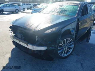 2015 Hyundai Genesis 3.8L with VIN KMHGN4JE1FU073697, listed as a IAAI auction lot 41743060 with 104,938 mi miles. Bid and sale history available at carsss.com. Image 6.