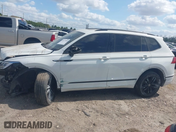 2022 Volkswagen Tiguan SE R-Line Black with VIN 3VVCB7AX5NM040222, listed as a IAAI auction lot 42073998 with 36,225 mi miles and . Bid and sale history available at DreamBid. Image 14.