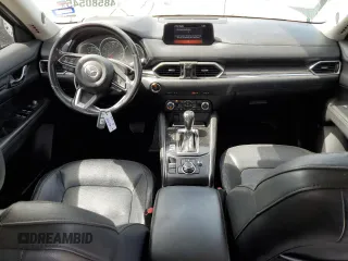 2018 Mazda CX-5 Grand Touring with VIN JM3KFBDM8J0474819, listed as a Copart auction lot 48580545 with 76,917 mi miles and Salvage Title. Bid and sale history available at DreamBid. Image 8.