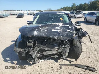 2015 Infiniti Q50 Premium with VIN JN1BV7AP4FM345938, listed as a Copart auction lot 77319234 with 134,731 mi miles and Salvage Title. Bid and sale history available at carsss.com. Image 5.