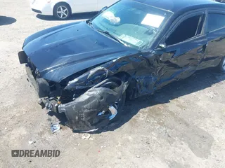 2014 Dodge Charger SE with VIN 2C3CDXBG7EH328575, listed as a IAAI auction lot 41998842 with 73,962 mi miles and . Bid and sale history available at carsss.com. Image 6.