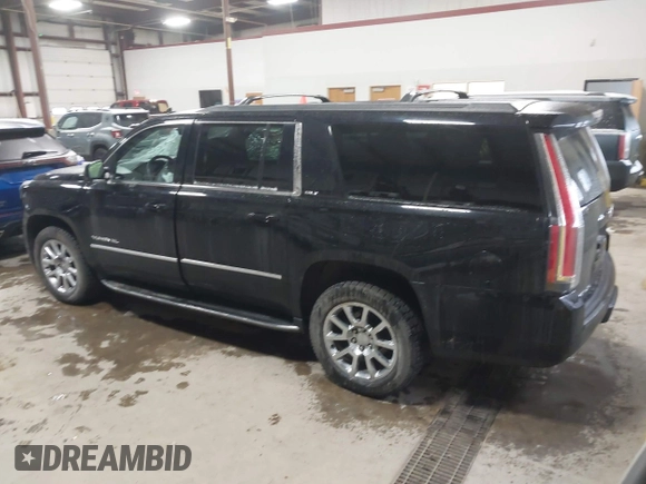 2015 GMC Yukon XL SLT with VIN 1GKS2HKC9FR175011, listed as a IAAI auction lot 41510519 with 194,136 mi miles. Bid and sale history available at carsss.com. Image 3.