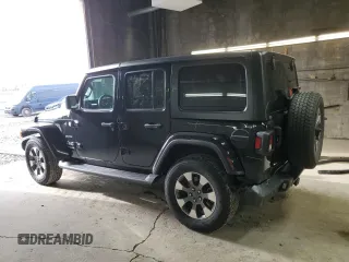 2022 Jeep Wrangler Unlimited Sahara Altitude with VIN 1C4HJXEG0NW115877, listed as a Copart auction lot 80689494 with 30,928 mi miles and Salvage title. Bid and sale history available at DreamBid. Image 2.