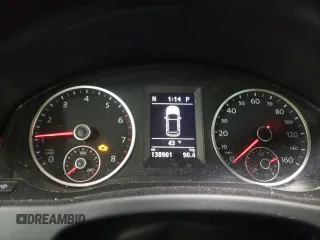 2013 Volkswagen Tiguan SE z VIN WVGBV3AX8DW092397, wystawiony jako Copart lot #51956225 z przebiegiem 138 901 mil mil oraz Szkoda całkowita • Salvage title. Historia ofert i sprzedaży dostępna na DreamBid. Obrazek 9.