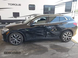 2018 BMW X2 sDrive28i with VIN WBXYJ3C32JEJ84291, listed as a IAAI auction lot 42575234 with 65,081 mi miles and . Bid and sale history available at DreamBid. Image 14.