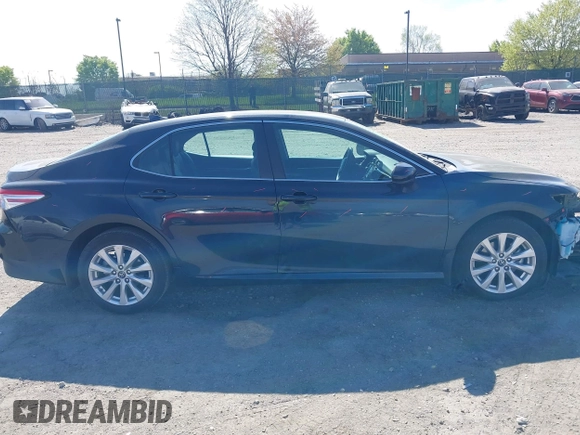 2019 Toyota Camry LE with VIN 4T1B11HK3KU254083, listed as a IAAI auction lot 42091530 with 26,635 mi miles and . Bid and sale history available at DreamBid. Image 13.