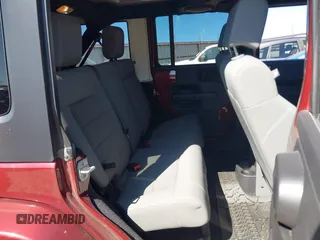 2008 Jeep Wrangler Unlimited Sahara с VIN 1J4GA59118L594851, выставлен на аукционе IAAI как лот 41643490 с пробегом 59 421 миль миль и . История ставок и продаж доступна на DreamBid. Изображение 8.