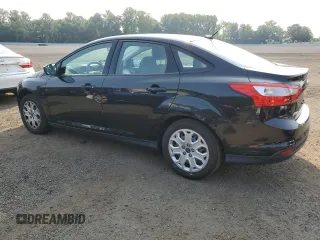 2012 Ford Focus SE with VIN 1FAHP3F22CL455790, listed as a Copart auction lot 60493005 with 100,081 mi miles and Salvage title. Bid and sale history available at DreamBid. Image 2.