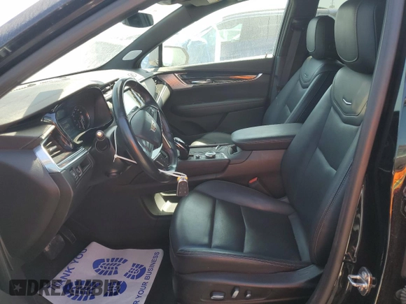 2023 Cadillac XT5 FWD Premium Luxury with VIN 1GYKNCRS6PZ171335, listed as a Copart auction lot 51859385 with 52,691 mi miles and Clean Title. Bid and sale history available at carsss.com. Image 7.