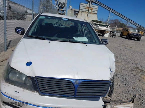 2002 Mitsubishi Lancer OZ-Rally with VIN JA3AJ86E42U039140, listed as a IAAI auction lot 41853888 with 328,181 mi miles. Bid and sale history available at carsss.com. Image 12.