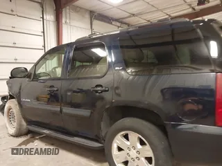 2007 GMC Yukon SLT z VIN 1GKFK130X7J115798, wystawiony jako IAAI lot #42039550 z przebiegiem 263 539 mil mil oraz . Historia ofert i sprzedaży dostępna na DreamBid. Obrazek 15.