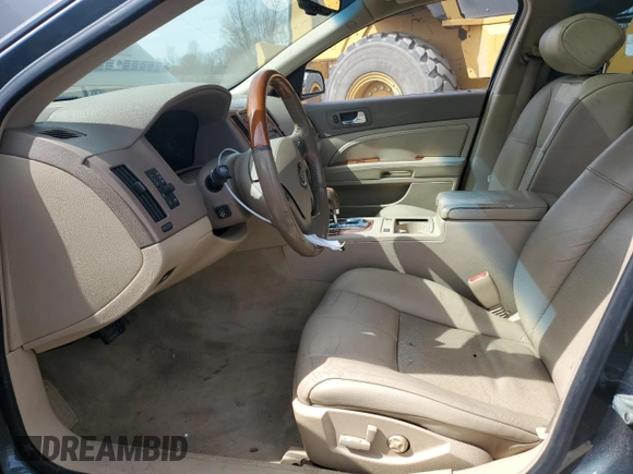 2007 Cadillac STS z VIN 1G6DW677970160672, wystawiony jako Copart lot #50568525 z przebiegiem 127 699 mil mil oraz Szkody całkowita. Historia ofert i sprzedaży dostępna na DreamBid. Obrazek 7.