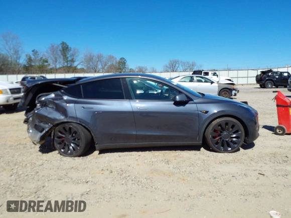 2022 Tesla Model Y Performance with VIN 7SAYGDEF9NF544205, listed as a IAAI auction lot 41825453 with 33,039 mi miles and . Bid and sale history available at DreamBid. Image 13.