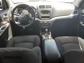 2013 Dodge Journey American Value with VIN 3C4PDCAB1DT650629, listed as a Copart auction lot 62072965 with 87,674 mi miles and Salvage title. Bid and sale history available at DreamBid. Image 8.