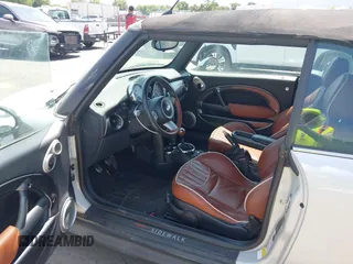 2008 MINI Convertible S with VIN WMWRH335X8TU80600, listed as a IAAI auction lot 42558412 with 105,970 mi miles and . Bid and sale history available at DreamBid. Image 5.
