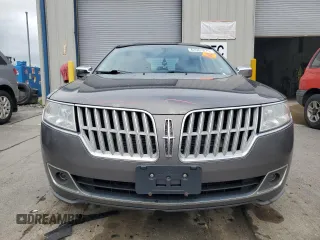 2012 Lincoln MKZ with VIN 3LNHL2JC1CR808663, listed as a Copart auction lot 61001675 with 153,627 mi miles and Salvage title. Bid and sale history available at DreamBid. Image 5.