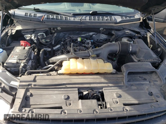 2018 Ford F-150 XL with VIN 1FTMF1EP0JKC60951, listed as a Copart auction lot 77759594 with 152,604 mi miles and Salvage title. Bid and sale history available at DreamBid. Image 11.