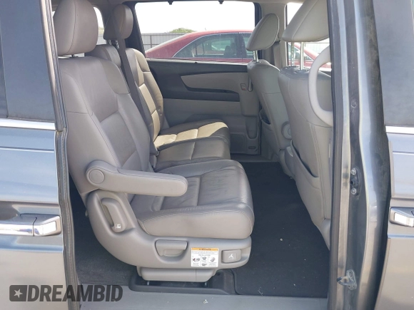 2011 Honda Odyssey EX-L with VIN 5FNRL5H69BB092752, listed as a IAAI auction lot 42245534 with 142,718 mi miles and . Bid and sale history available at DreamBid. Image 8.