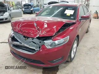 2015 Ford Taurus SEL z VIN 1FAHP2H88FG163179, wystawiony jako IAAI lot #42345579 z przebiegiem 142 424 mil mil oraz . Historia ofert i sprzedaży dostępna na DreamBid. Obrazek 6.