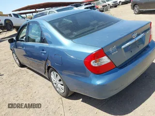 2003 Toyota Camry LE with VIN 4T1BE32KX3U682520, listed as a IAAI auction lot 42056194 with 116,969 mi miles and . Bid and sale history available at DreamBid. Image 3.