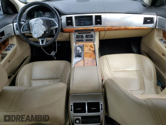 2014 Jaguar XF SC with VIN SAJWA0EX3E8U17748, listed as a Copart auction lot 52010435 with 84,685 mi miles and Salvage Title. Bid and sale history available at DreamBid. Image 8.