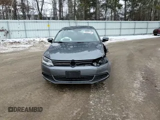 2013 Volkswagen Jetta SE with VIN 3VWDX7AJ2DM309725, listed as a Copart auction lot 86052114 with 70,828 mi miles and Salvage title. Bid and sale history available at DreamBid. Image 11.