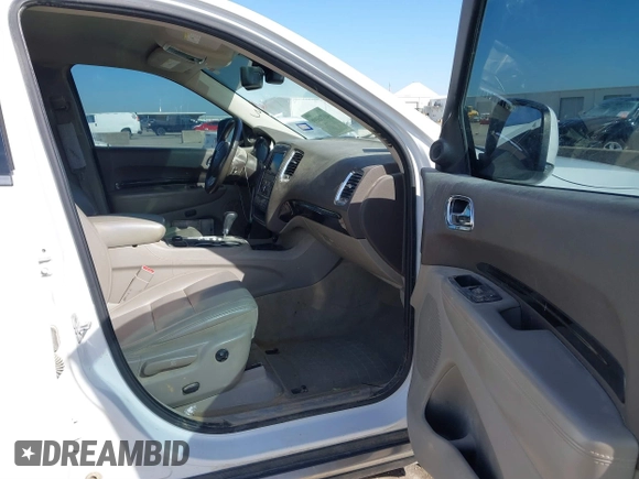 2013 Dodge Durango Crew with VIN 1C4SDJDT6DC510333, listed as a IAAI auction lot 41776099 with 180,431 mi miles and . Bid and sale history available at DreamBid. Image 5.