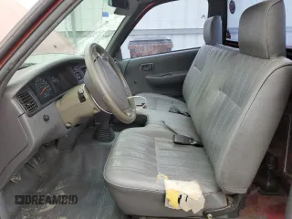 1996 Toyota T100 with VIN JT4JM11D3T0010204, listed as a Copart auction lot 50201305 with 188,702 mi miles and Salvage Title. Bid and sale history available at DreamBid. Image 7.