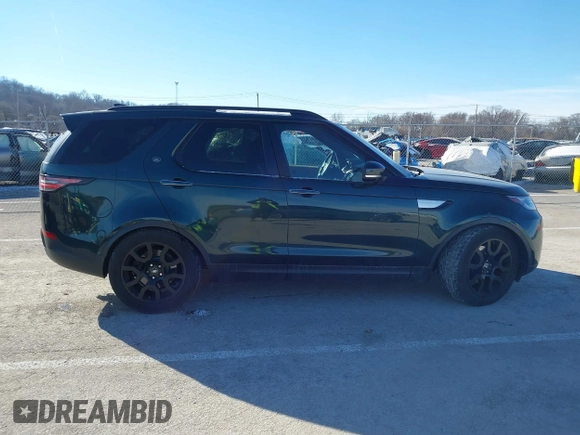 2017 Land Rover Discovery HSE Luxury z VIN SALRHBBK2HA031176, wystawiony jako IAAI lot #41567755 z przebiegiem 102 895 mil mil oraz . Historia ofert i sprzedaży dostępna na DreamBid. Obrazek 13.