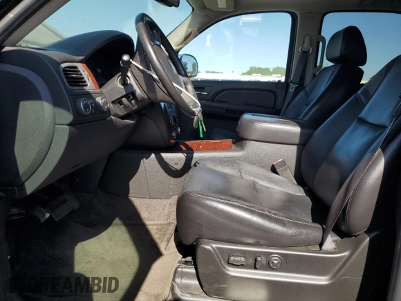 2009 Chevrolet Tahoe LTZ with VIN 1GNFK33089R139455, listed as a Copart auction lot 58953995 with 176,029 mi miles and Salvage title. Bid and sale history available at DreamBid. Image 7.