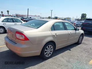 2006 Mercury Milan with VIN 3MEHM07166R644258, listed as a IAAI auction lot 42484544 with 65,230 mi miles and . Bid and sale history available at DreamBid. Image 4.