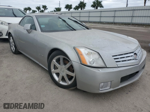 2008 Cadillac XLR z VIN 1G6YV36A285600199, wystawiony jako Copart lot #76229514 z przebiegiem Nie podano mil oraz Szkoda całkowita • Salvage title. Historia ofert i sprzedaży dostępna na DreamBid. Obrazek 4.